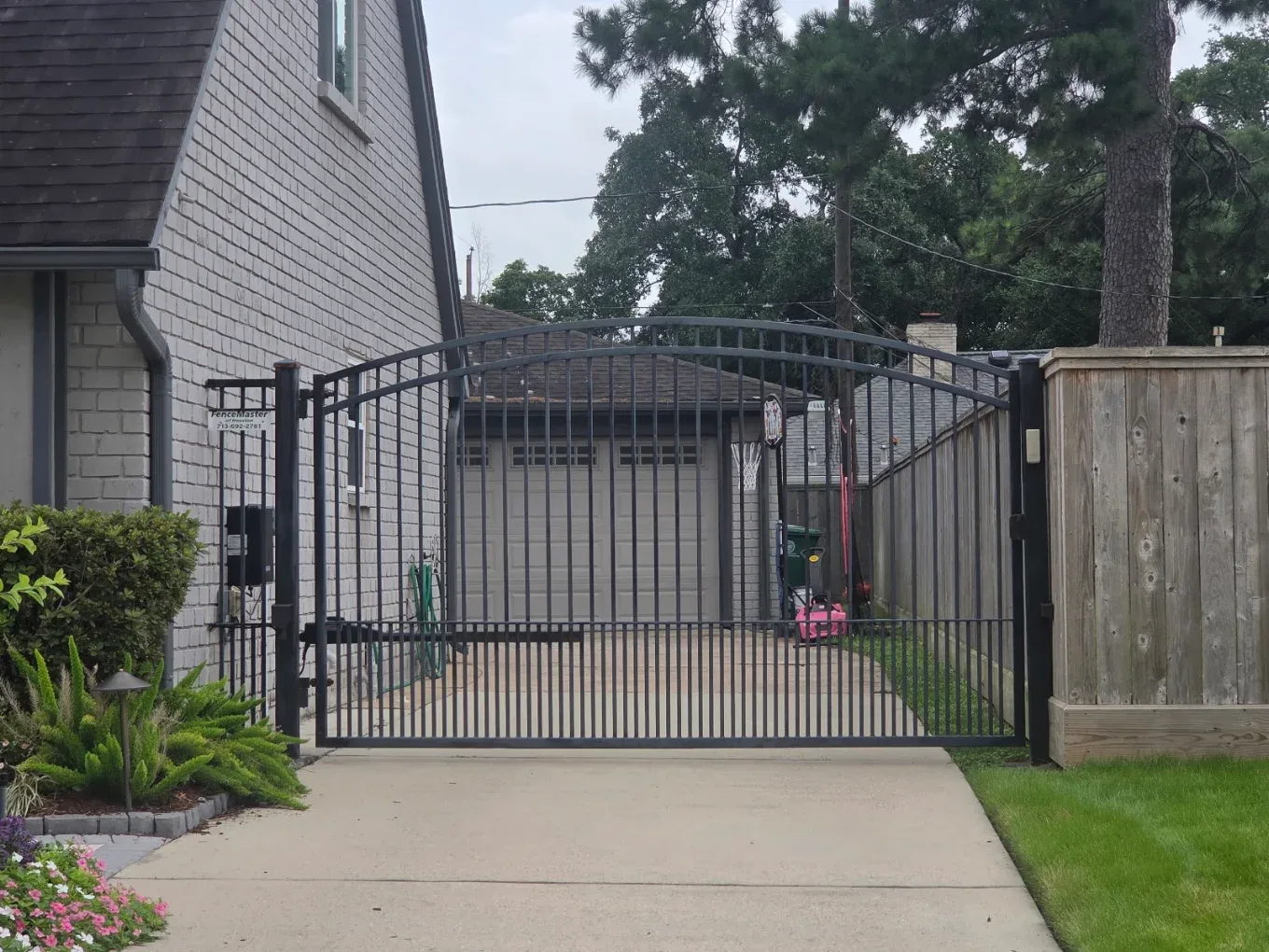 Arched Iron Driveway Gate